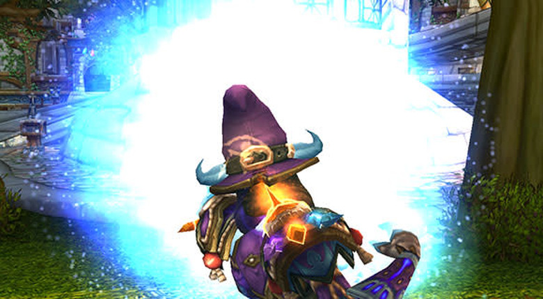 A female draenei mage casts many portal spells in one location.