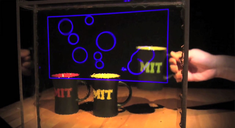 MIT nanoparticle-based transparent glass display