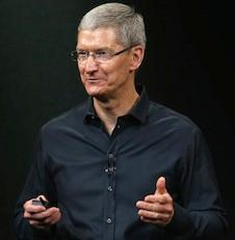 tim cook gesturing black shirt