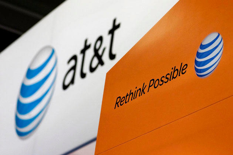 The At&T Inc. logo is displayed during the CTIA Enterprise & Applications conference at the Moscone Center in San Francisco, California, U.S., on Thursday, Oct. 7, 2010. The number of smartphone owners in the U.S., the biggest market for the mobile devices, rose 11 percent to 53.4 million in the quarter ended July, accounting for 23 percent of global shipments. Photographer: David Paul Morris/Bloomberg via Getty Images