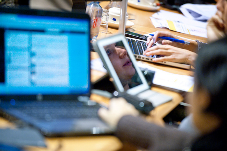 Journalists using laptops and iPads at the European Parliament
