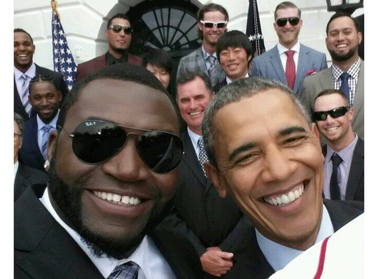 David Ortiz of the Boston Red Sox takes a selfie with President Obama