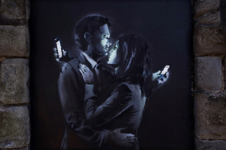 Banksy's latest works tackle technology, surveillance and our crumbling humanity