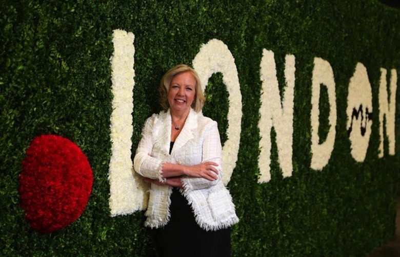 EMBARGOED TO 1400 WEDNESDAY APRIL 16. EDITORIAL USE ONLY Entrepreneur and Dragonâs Den investor Deborah Meaden, stands in front of an arrangement of flowers during a visit to New Covent Garden Market in southwest London, championing the new Dot London Internet domain. PRESS ASSOCIATION Photo. Picture date: Wednesday April 16, 2014. Forty business leaders from across London have endorsed the new Dot London Internet domain which businesses can apply for from 29 April 2014. Photo credit should read: Geoff Caddick/PA Wire