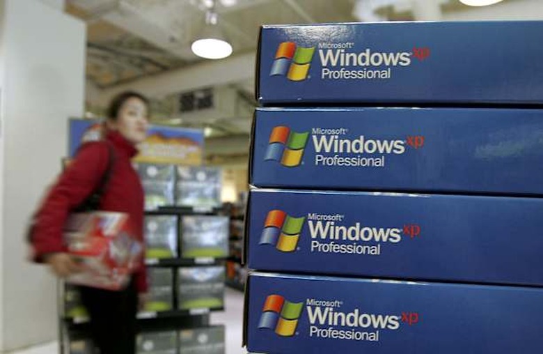 A customer walks near a display of Micro