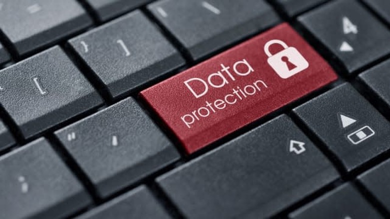 Security Concept. Words Data protection on button of computer keyboard.