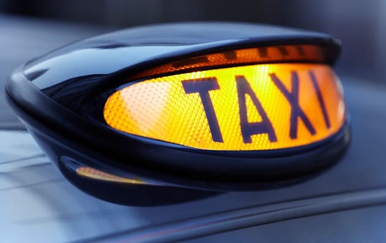 Close up of lit taxi sign