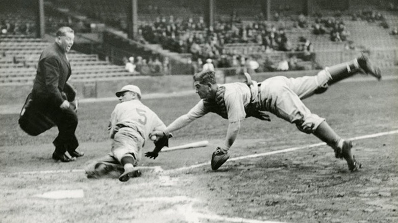Mickey Cochrane and Pinky Whitney in a close call at home base