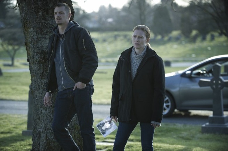 Joel Kinnaman (L) and Mireille Enos (R) in a scene from Netflix's 
