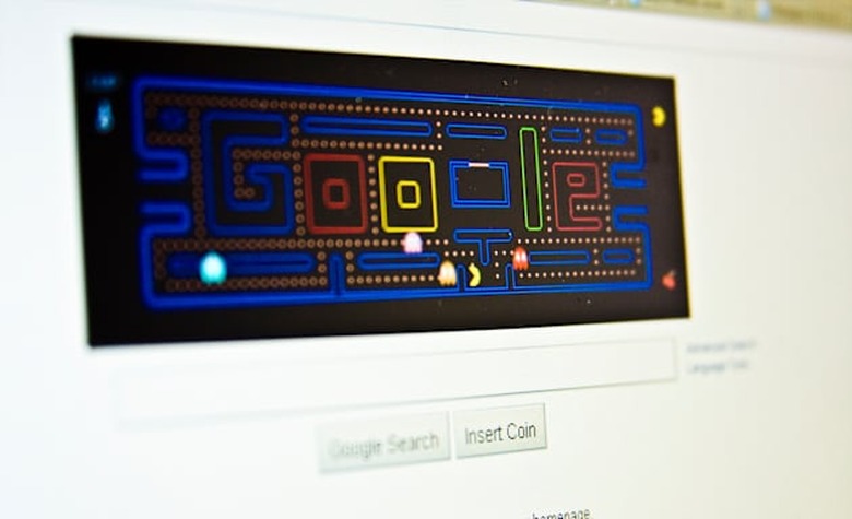 Google's homepage on Friday May 21, 2010 www.google.com Google page Pac Man game and an insert coin button