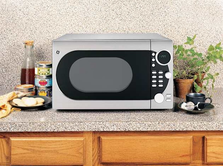 New GE Countertop Microwave Oven with Rotisserie