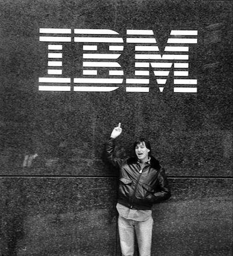 Steve Jobs flips off the IBM logo in 