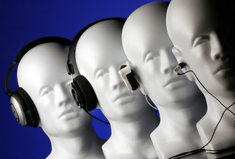 DENVER, COLORADO, DECEMBER 6, 2006--Variety of headphones for Play cover story. From left: Bose noise canceling headphones (from