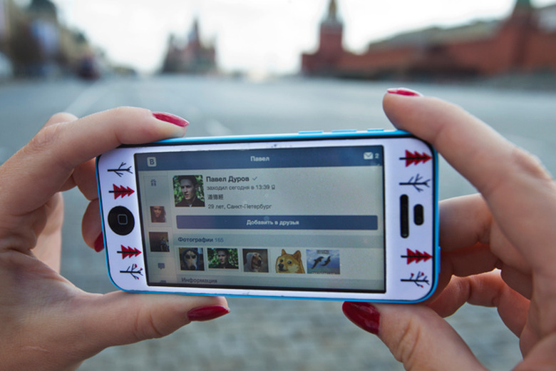 Looking at Russia's Vkontakte social network on an iPhone 5 in Moscow
