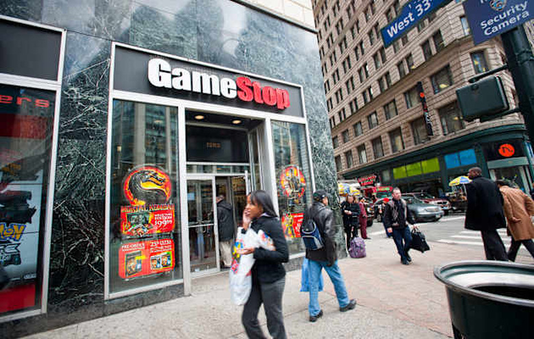 C1YC8B A GameStop video game store in the Herald Square shopping district in New York gamestop; videogames; shopping; electronic