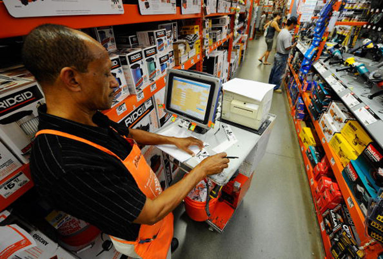Home Depot worker takes inventory