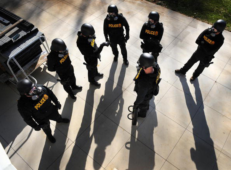 DEA officers about to go on a simulated raid