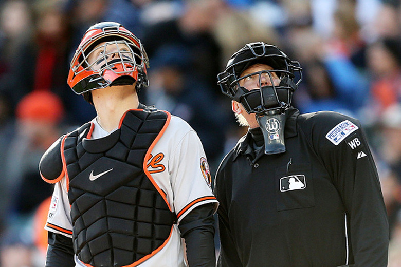 MLB baseball players watch a drone fly overhead
