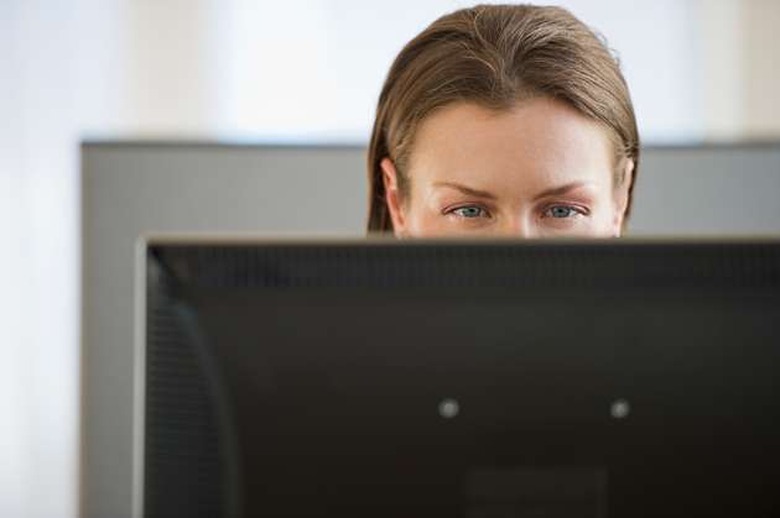 Eyes looking at computer monitor in officePeople, Business, Technology, Horizontal, Indoors, Office, 30-34 Years, Front View, C