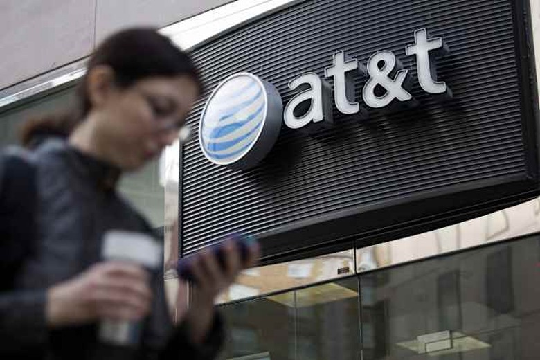 AT&T Cuts 2014 Forecast, Misses Estimates Amid Price Battles