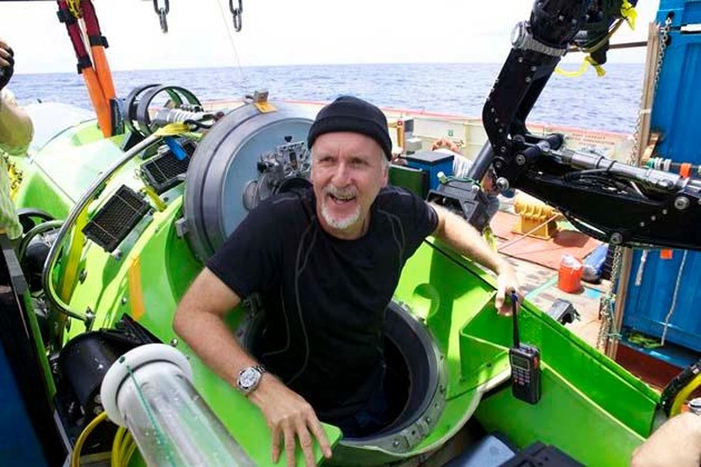 PERMITTED USE: This image may be downloaded or is otherwise provided at no charge for one-time use for coverage or promotion of DEEPSEA CHALLENGE 3D and exclusively in conjunction thereof. Copying, distribution, archiving, sublicensing, sale, or resale of the image is prohibited. REQUIRED CREDIT AND CAPTION: Any and all image uses must (1) be properly credited to the relevant photographer, as shown in this metadata, and (2) be accompanied by a caption which makes reference to DEEPSEA CHALLENGE 3D.DEFAULT: Failure to comply with the prohibitions and requirements set forth above will obligate the individual or entity receiving this image to pay a fee determined by National Geographic. 03: (23579)Photo by Mark Thiessen/National GeographicFilmmaker and National Geographic Explorer-in-Residence James Cameron emerges from the DEEPSEA CHALLENGER submersible after his successful solo dive to the Mariana Trench, the deepest part of the ocean. The dive was part of DEEPSEA CHALLENGE, a joint scientific expedition by Cameron, the National Geographic Society and Rolex to conduct deep-ocean research.