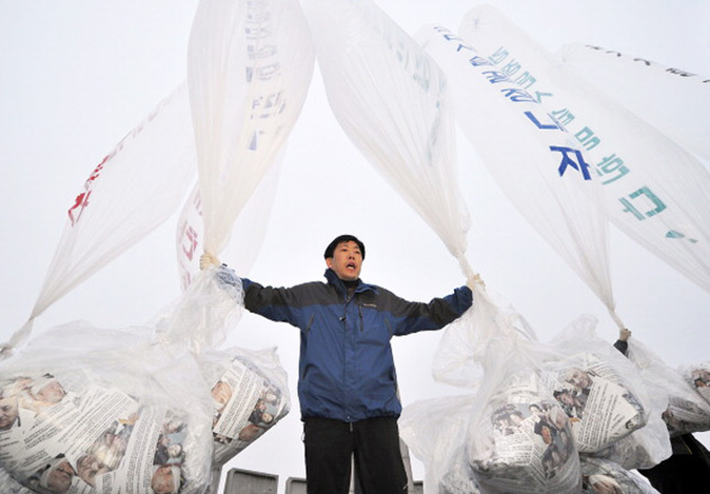 Defector and activist Park Sang-hak with airdrop balloons