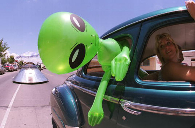 An alien doll on a trip to Roswell