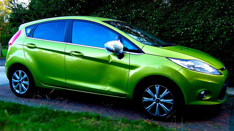A dented Ford Fiesta