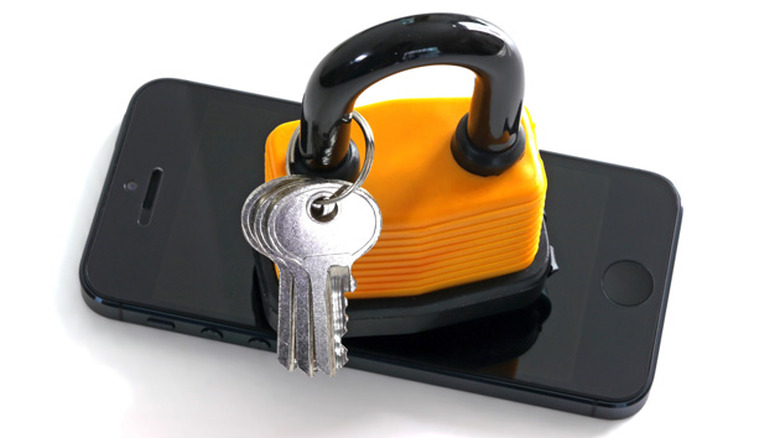 A padlock on top of an iPhone 5