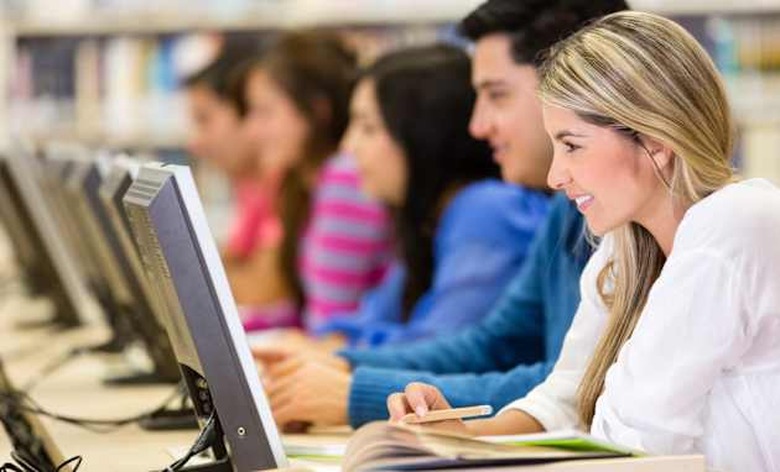 group of young people studying...