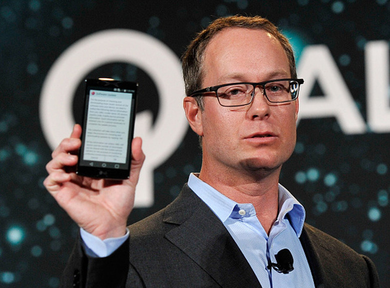 Qualcomm's Derek Aberle holds up the G Flex2