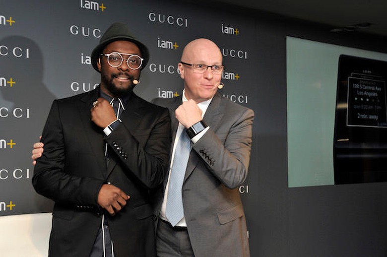 BASEL, SWITZERLAND - MARCH 19: i.am+ Founder and CEO will.i.am and Gucci Timepieces President and CEO Stephane Linder pose during the Gucci Timepieces press conference on March 19, 2015 in Basel, Switzerland. Gucci Timepieces and the Founder and CEO of i.am+ will.i.am announce a special partnership for the development of innovative wearable device concept on the occasion of the 2015 edition of Baselworld, the watch industry's leading international trade fair. (Photo by The Image Gate/The Image Gate)