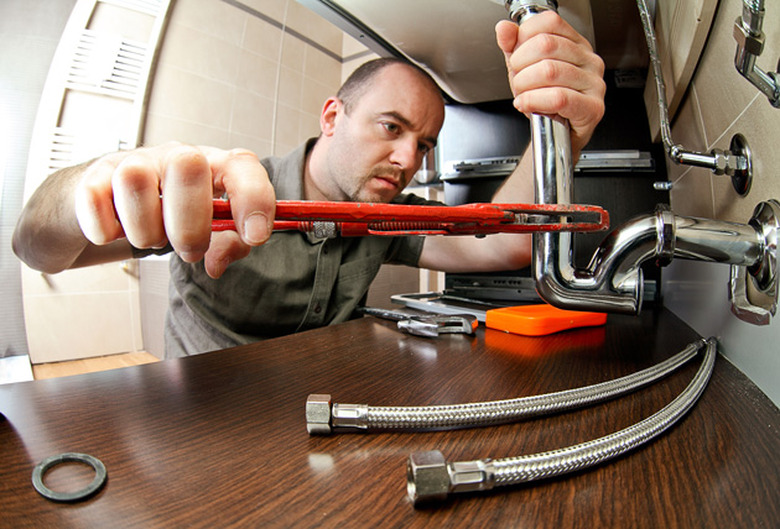 A plumber at work