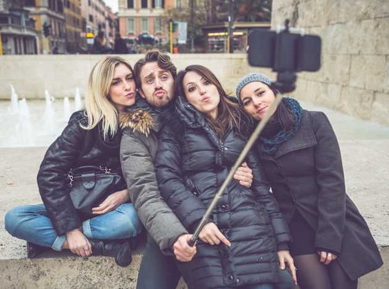 Friends taking a selfie stick in Rome