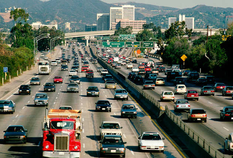 Traffic on Los Angeles highway and with office buildings in the background,Motion, Routine, Mode of Transport, City, Road, Tran