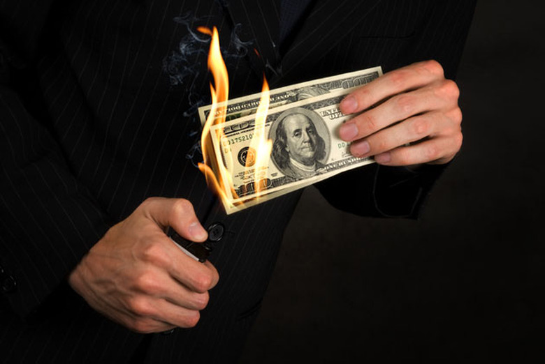 Comcast lit money on fire