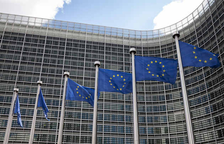 Belgium, Brussels, European Commission, European flags at Berlaymont building