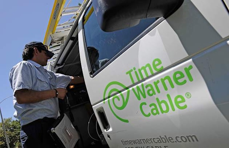 Time Warner Profits Rise 14 Percent