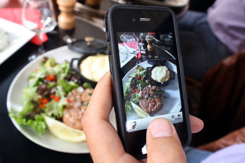 Taking a photo of your food, as you do