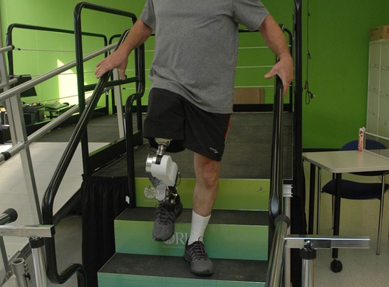 A bionic leg wearer descends stairs