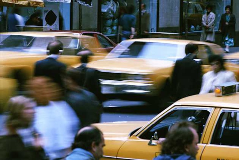 |blur|cab|center|city|color|commute|convenience|crowd|day|exterior|gray|horizontal|landmark|motion|movement|new york city|people
