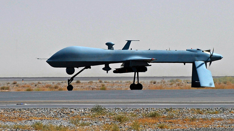 A Predator drone carrying a missile