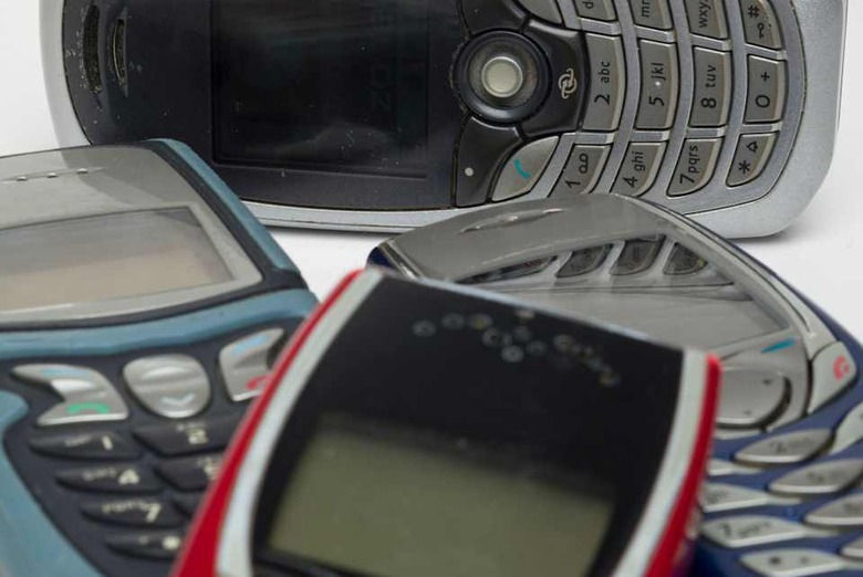 Selective focus of a bunch of old mobile phones