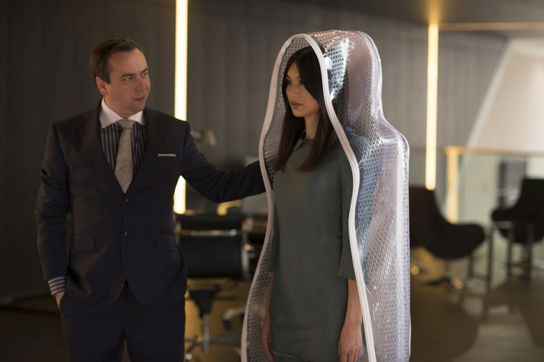 Dan Tetsell as Salesman and Gemma Chan as Anita - Humans _ Season 1, Episode 1 - Photo Credit: Des Willie/Kudos/AMC/C4