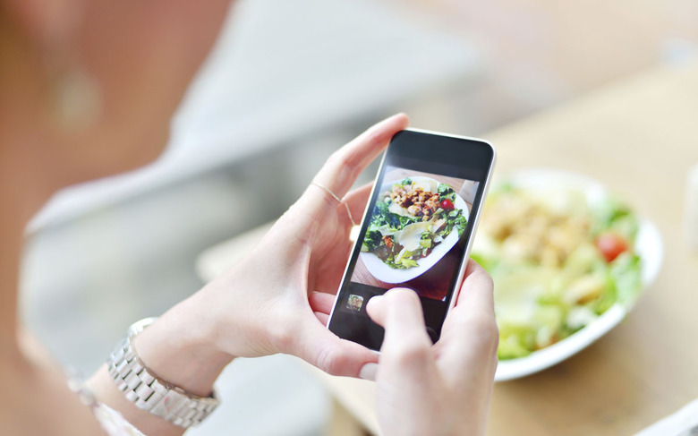 Taking a photo of your food, as you do