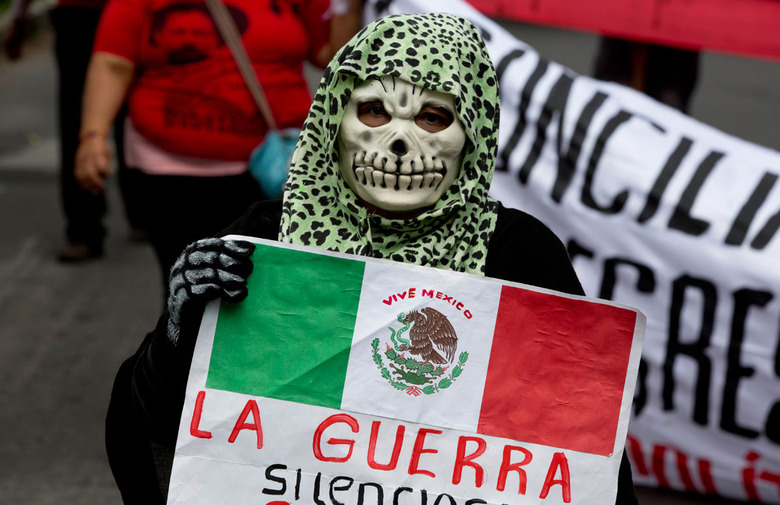 A Mexican protesting gang violence