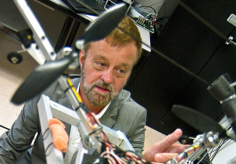 UT Arlington's Frank Lewis surrounded by technology