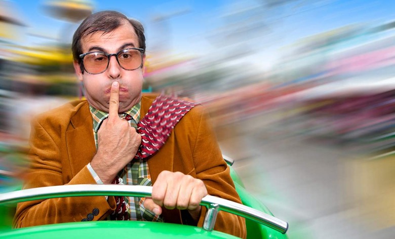 A sick man in a fairground carousel