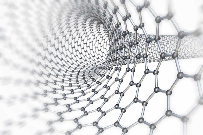 Buckytube. Computer artwork of a bent carbon nanotube, also known as a buckytube, showing the hexagonal carbon structure. This i