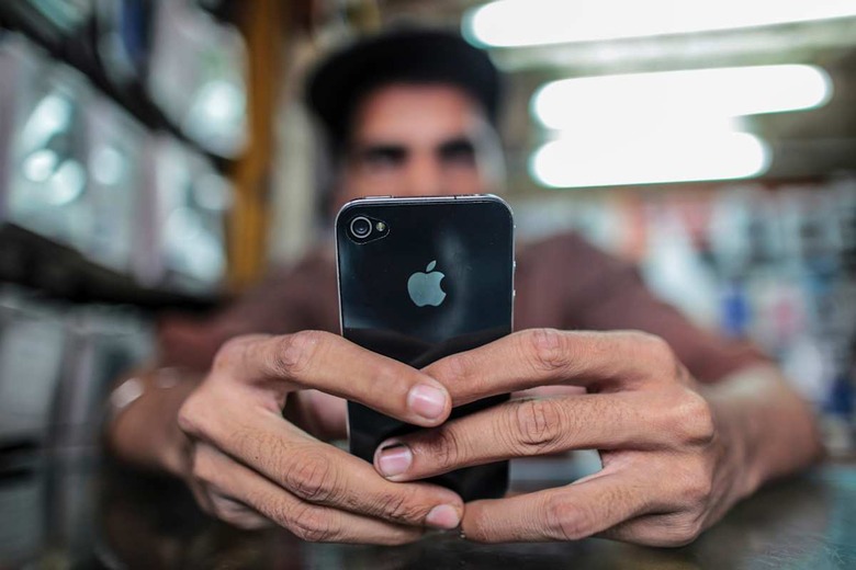 Mobile Phone Stores And Users Ahead Of The Telecom Spectrum Auction